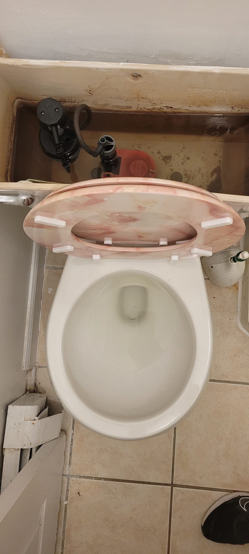 Toilet tank on Master bath of apartment 2